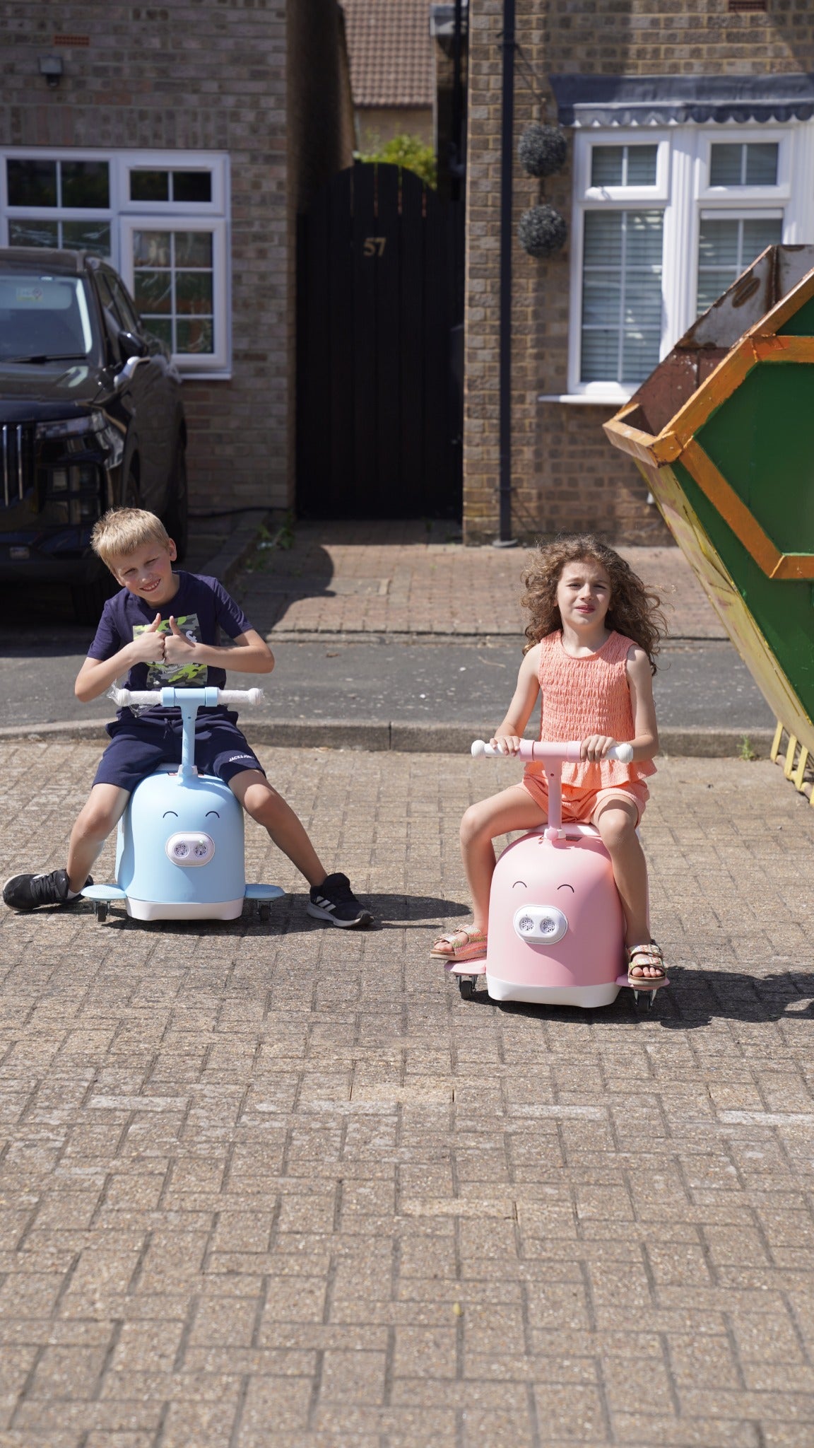 Children with Piggy ride-ons